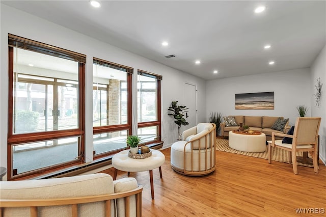 20 Harbour Pointe, Buffalo, NY 14202 - living room with light wood finished floors, recessed lighting, and baseboards