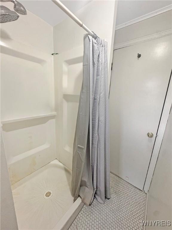 66 Northrup Pl, Buffalo, NY 14214 - full bath featuring a stall shower and tile patterned floors