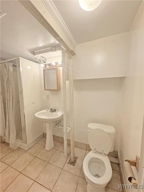 66 Northrup Pl, Buffalo, NY 14214 - full bathroom with a stall shower, tile patterned flooring, toilet, and baseboards
