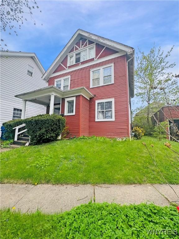 66 Northrup Pl, Buffalo, NY 14214 - view of front of home with a front lawn