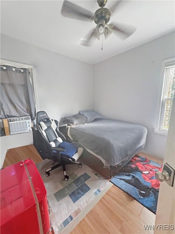 75 Northrup Pl, Buffalo, NY 14214 - bedroom featuring wood finished floors and a ceiling fan