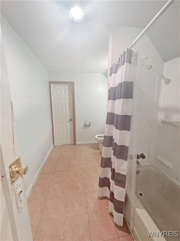 75 Northrup Pl, Buffalo, NY 14214 - bathroom featuring toilet, tile patterned flooring, shower / tub combo with curtain, and baseboards