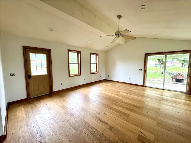 unfurnished living room with light wood-type flooring, baseboards, ceiling fan, and lofted ceiling
