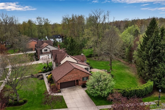 view from above of property with a forest