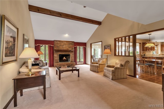 living area with carpet, beamed ceiling, high vaulted ceiling, baseboards, and a fireplace