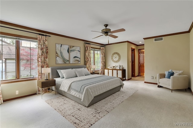 bedroom with light carpet, baseboards, ornamental molding, and ceiling fan