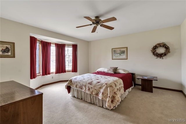 bedroom featuring carpet, baseboards, and ceiling fan