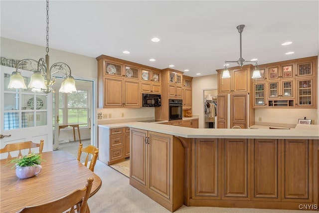 kitchen with black appliances, light countertops, brown cabinets, light carpet, and recessed lighting
