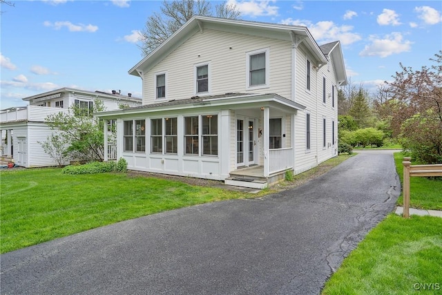 view of front of home with a front yard