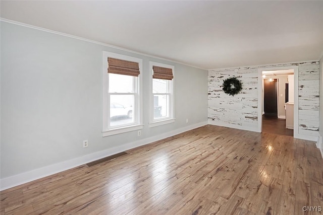 113 Olmstead Pl, Onondaga, NY 13219 - unfurnished room with crown molding, hardwood / wood-style floors, and baseboards