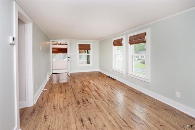 113 Olmstead Pl, Onondaga, NY 13219 - unfurnished room with light wood-type flooring, ornamental molding, and baseboards