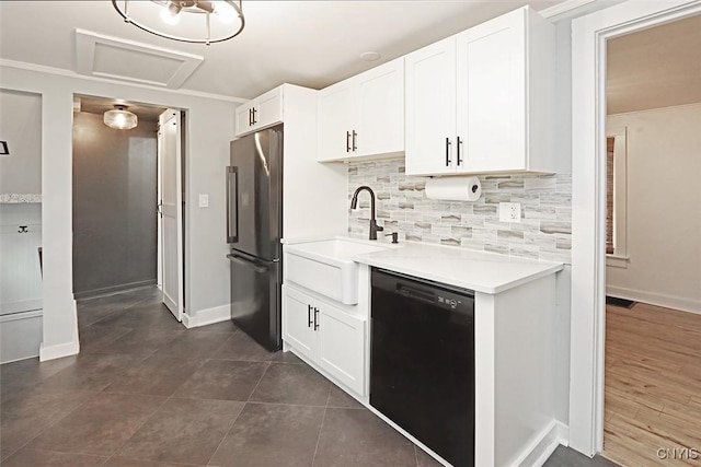 113 Olmstead Pl, Onondaga, NY 13219 - kitchen with dishwasher, freestanding refrigerator, tasteful backsplash, a sink, and light countertops