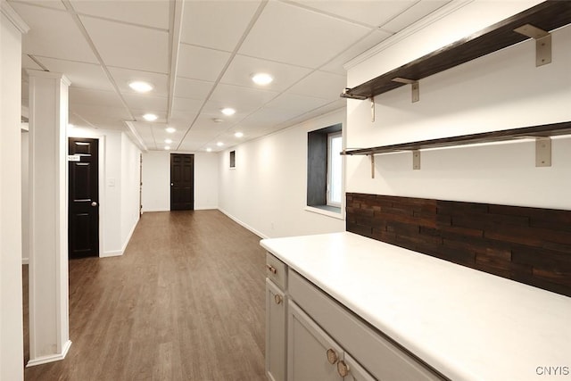 113 Olmstead Pl, Onondaga, NY 13219 - kitchen with open shelves, recessed lighting, wood finished floors, light countertops, and baseboards