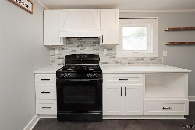 113 Olmstead Pl, Onondaga, NY 13219 - kitchen with black gas range oven, custom range hood, decorative backsplash, baseboards, and crown molding