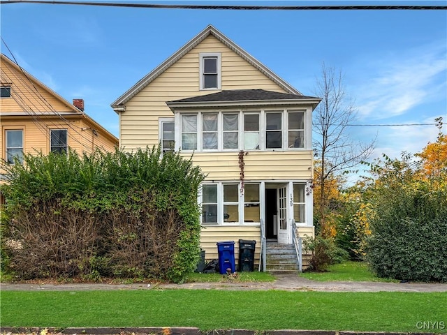 139 Pulaski St, Syracuse, NY 13204 - view of front of home with a front lawn