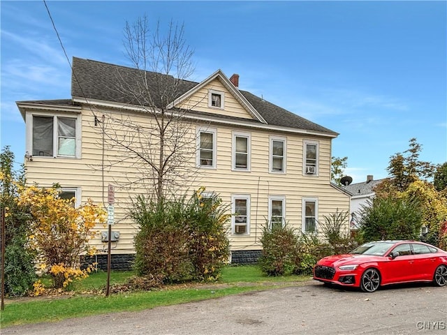 139 Pulaski St, Syracuse, NY 13204 - view of front facade featuring a chimney and roof with shingles