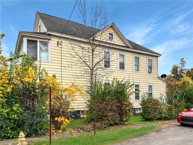 139 Pulaski St, Syracuse, NY 13204 - view of home's exterior featuring roof with shingles