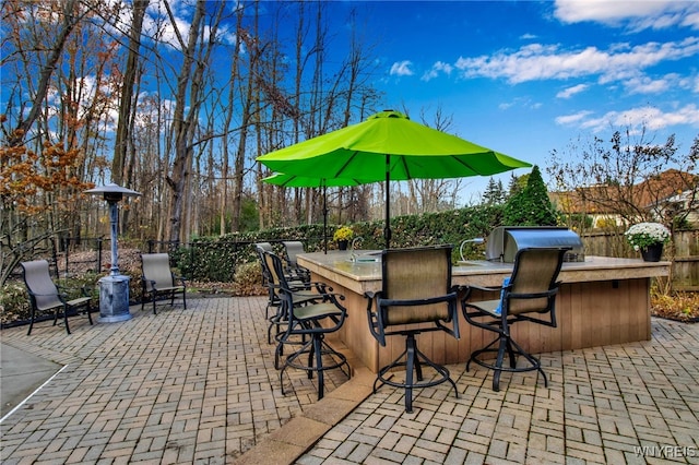 view of patio featuring a fenced backyard and area for grilling