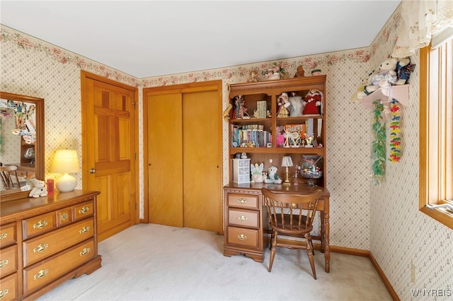 office area featuring light carpet and wallpapered walls