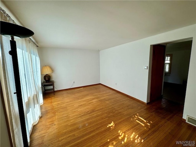 88 Loretto Dr, Cheektowaga, NY 14225 - unfurnished room with wood finished floors and baseboards