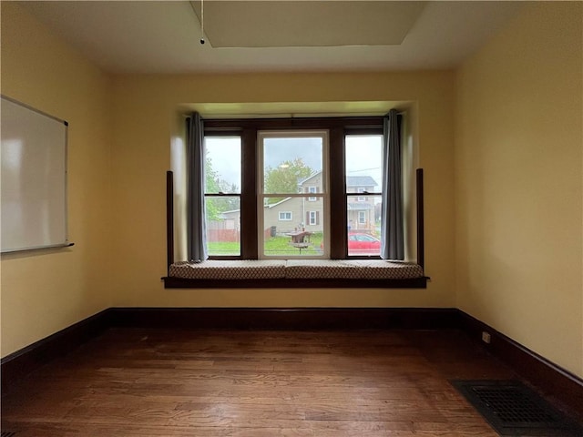 324 W Ave, Elmira-City, NY 14904 - spare room with wood finished floors and baseboards