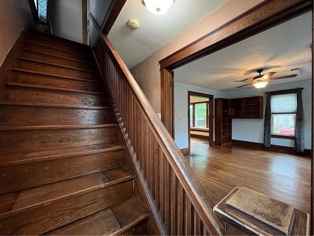 324 W Ave, Elmira-City, NY 14904 - stairs with wood finished floors and a ceiling fan