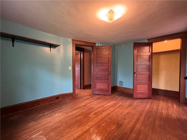 324 W Ave, Elmira-City, NY 14904 - unfurnished bedroom with wood finished floors and baseboards