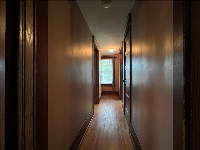 324 W Ave, Elmira-City, NY 14904 - hallway featuring hardwood / wood-style floors and baseboards