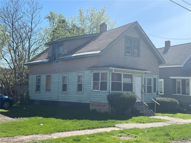 413 Fitch St, Syracuse, NY 13204 - view of front of property featuring entry steps, a chimney, and a front yard