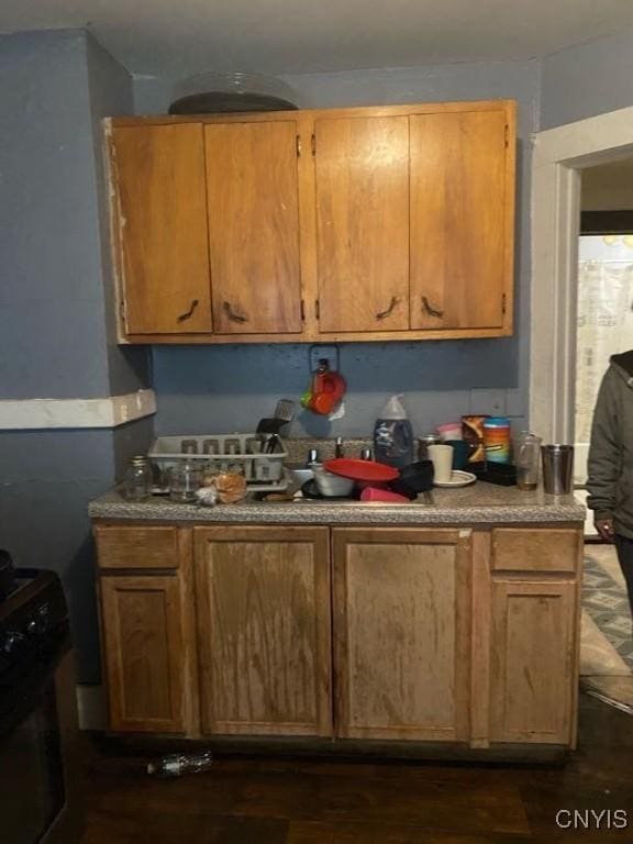 413 Fitch St, Syracuse, NY 13204 - kitchen featuring range and dark wood-style flooring