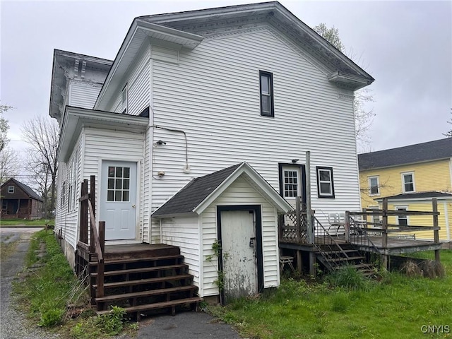 109 Mechanic St, Antwerp, NY 13608 - rear view of property with a shed, a wooden deck, and an outdoor structure