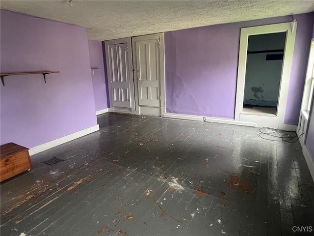 109 Mechanic St, Antwerp, NY 13608 - unfurnished room with a textured ceiling and baseboards