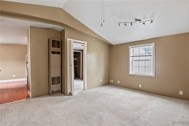 220 Clover Pl, Cheektowaga, NY 14225 - carpeted spare room with vaulted ceiling and a heating unit
