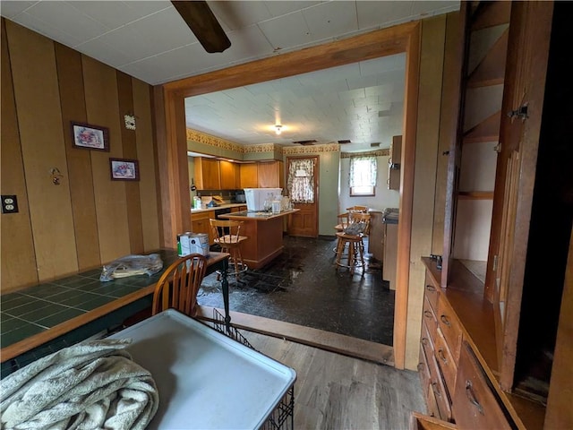 dining area with wood finished floors