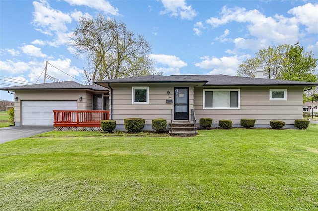 134 Schum Ln, Rochester, NY 14609 - single story home with a garage, asphalt driveway, and a front yard