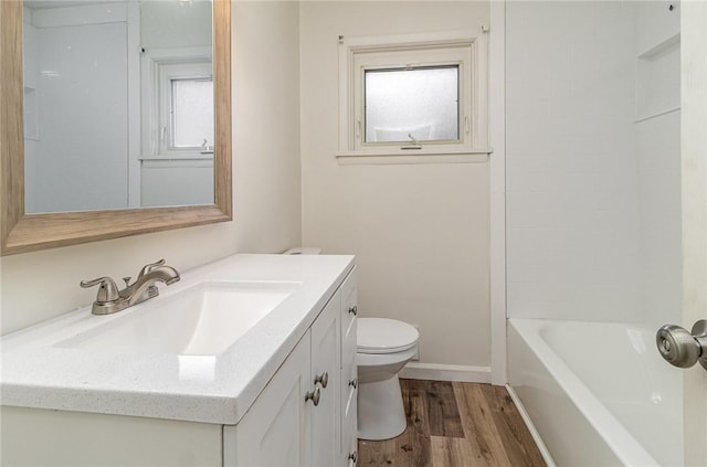 134 Schum Ln, Rochester, NY 14609 - bathroom with wood finished floors, toilet, and vanity