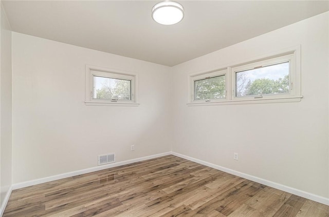 134 Schum Ln, Rochester, NY 14609 - empty room with baseboards and wood finished floors