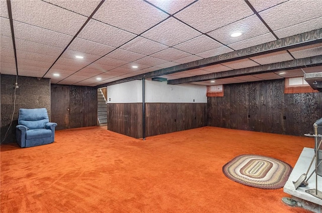 134 Schum Ln, Rochester, NY 14609 - finished below grade area featuring wooden walls, carpet flooring, a wainscoted wall, a drop ceiling, and recessed lighting