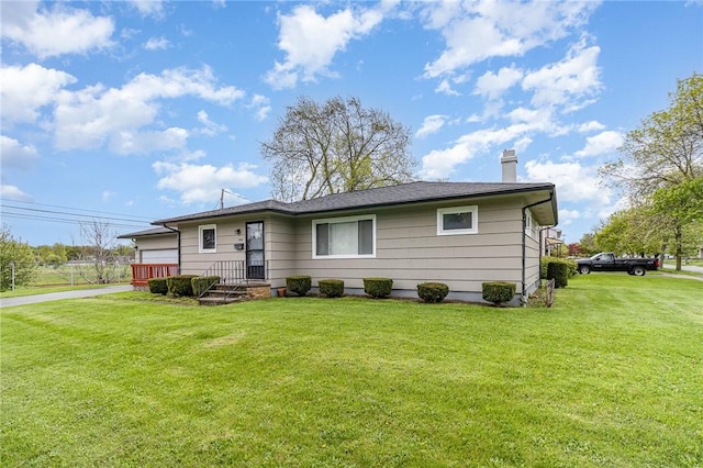 134 Schum Ln, Rochester, NY 14609 - view of front of home featuring a chimney and a front lawn