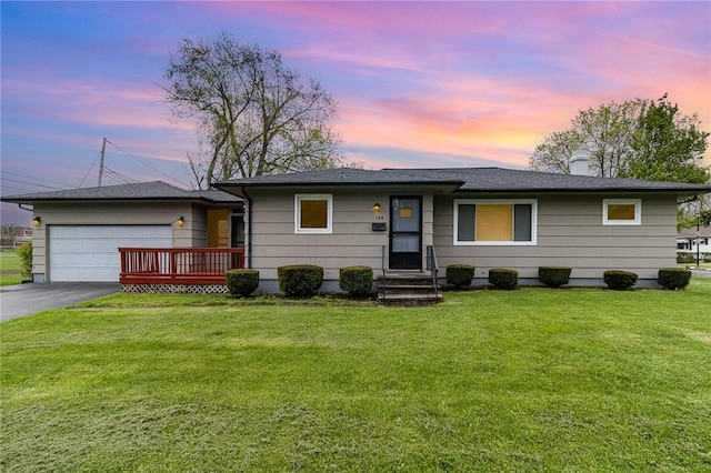 134 Schum Ln, Rochester, NY 14609 - single story home with a garage, asphalt driveway, a yard, and entry steps