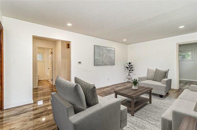 134 Schum Ln, Rochester, NY 14609 - living room with light wood-style flooring, recessed lighting, and baseboards