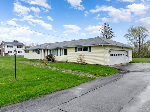 7732 Gifford Rd, Rome-Inside, NY 13440 - ranch-style house featuring an attached garage, a front lawn, and driveway