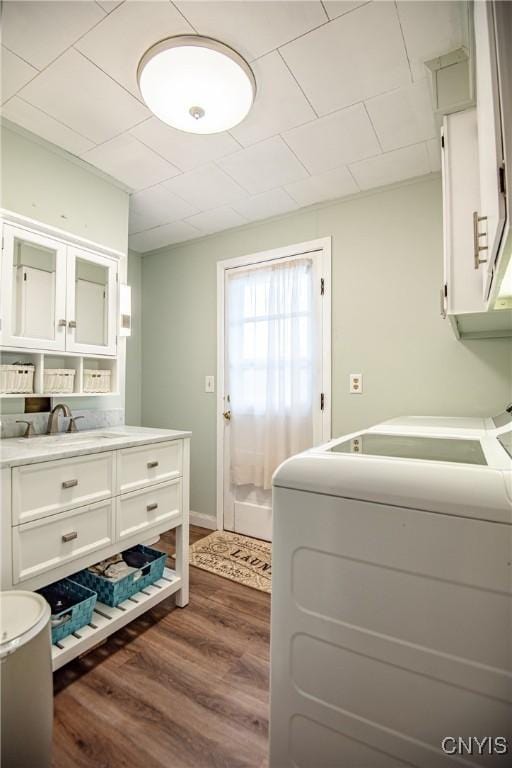 7732 Gifford Rd, Rome-Inside, NY 13440 - clothes washing area with dark wood finished floors and independent washer and dryer