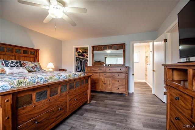 7732 Gifford Rd, Rome-Inside, NY 13440 - bedroom featuring dark wood finished floors, a walk in closet, a closet, and ceiling fan