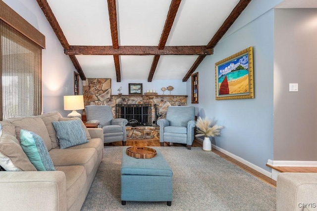 117 Shoreview Dr, Clay, NY 13090 - living area featuring wood finished floors, baseboards, and a stone fireplace