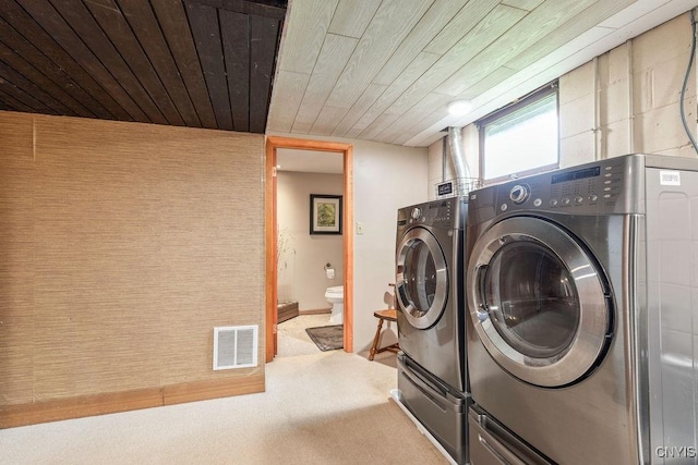 117 Shoreview Dr, Clay, NY 13090 - laundry area featuring independent washer and dryer, wood ceiling, carpet floors, and baseboards