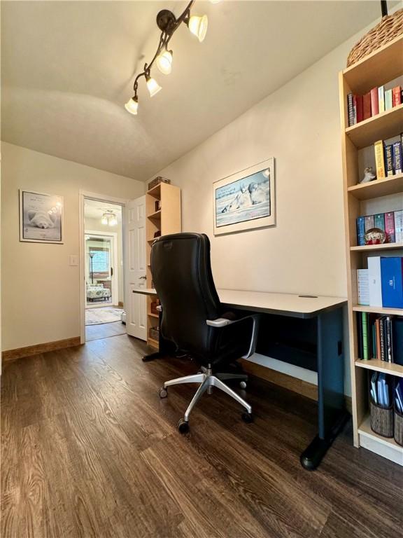 155 Hickory Grove Rd, Horseheads, NY 14845 - home office with dark wood-style flooring, baseboards, and rail lighting
