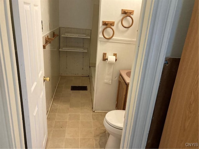 313-315 Whittier Ave, Syracuse, NY 13204 - bathroom featuring toilet, tile patterned floors, and vanity