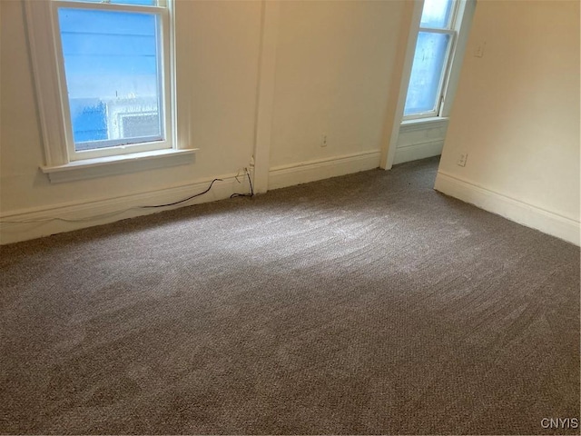 313-315 Whittier Ave, Syracuse, NY 13204 - unfurnished room with healthy amount of natural light, carpet floors, and baseboards
