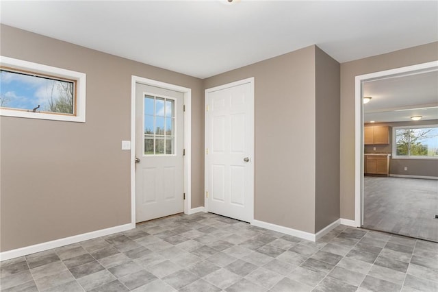 foyer with baseboards